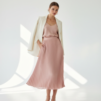 Pleated Skirt in Blush Pink - Model Wearing